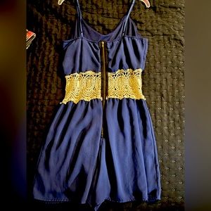 Beautiful romper with see through lace middle around waist